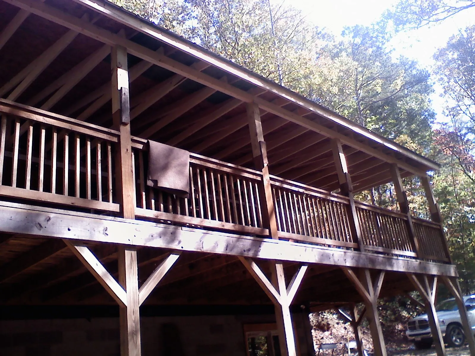 Timber framing under a new elevated porch and deck — Roof Leak Repair in Desmet by Roofing Brothers